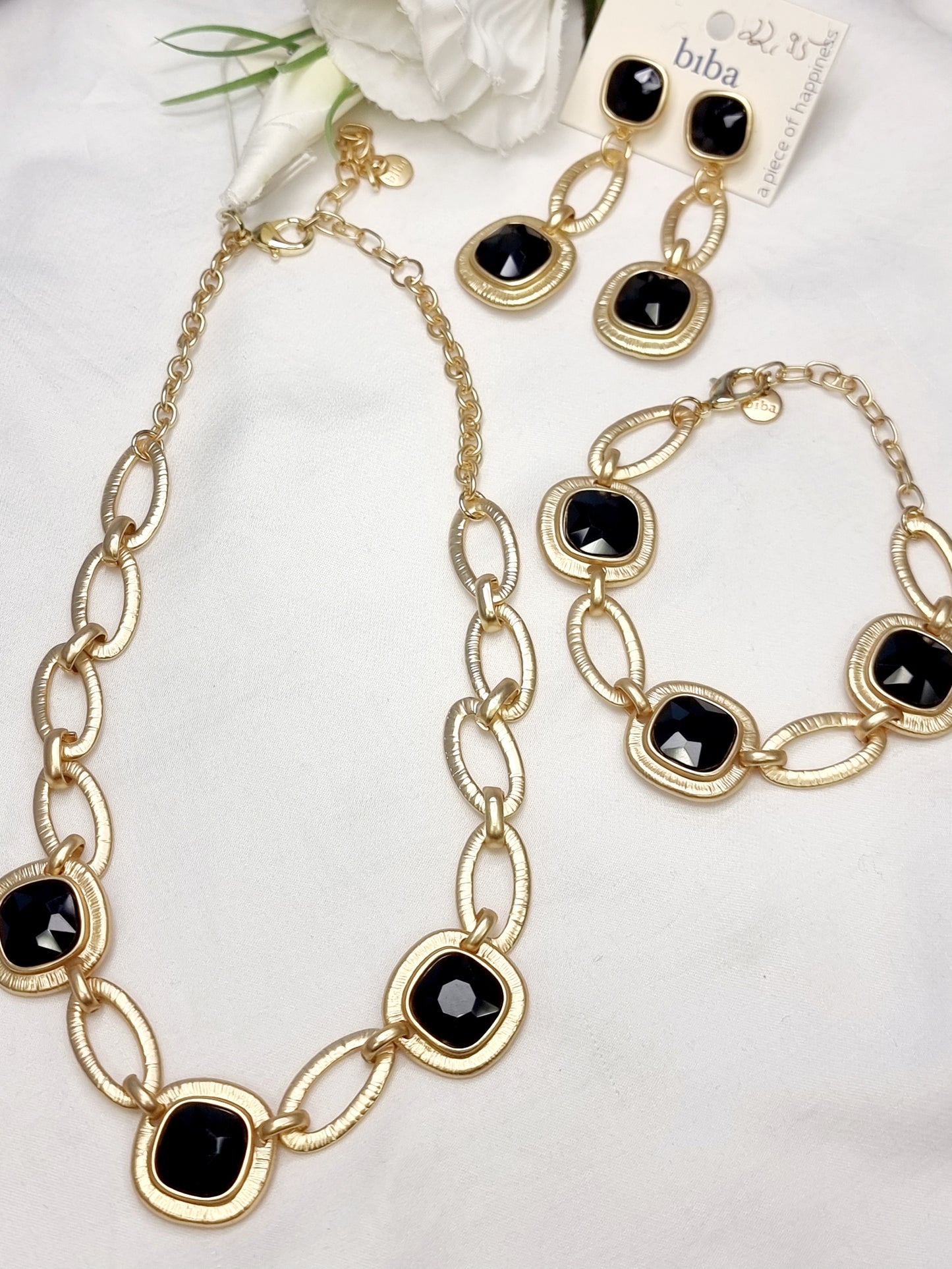 Ohrringe mit 2 Glieder in Gold und schwarz BIBA