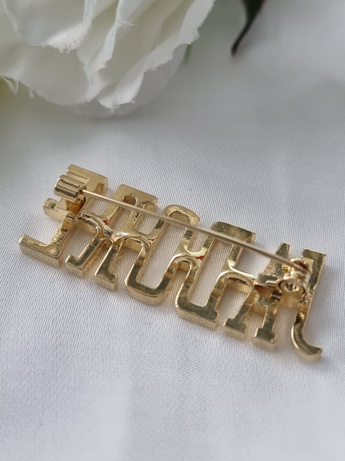 Edelstahlbrosche " Jardore " in Gold
