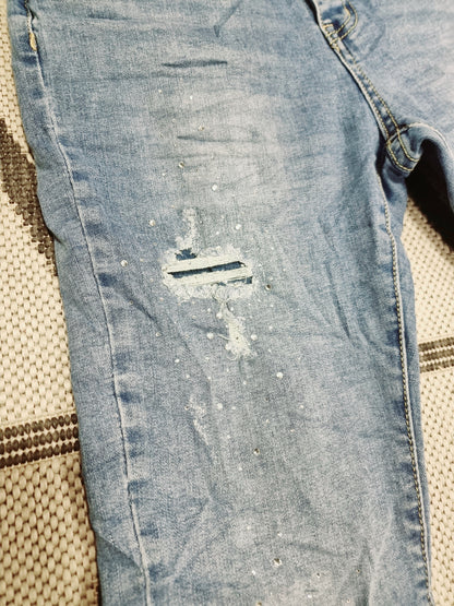 Jeans mit Glitzersteinchen und Schmuckknöpfen Jewelly JP-2601