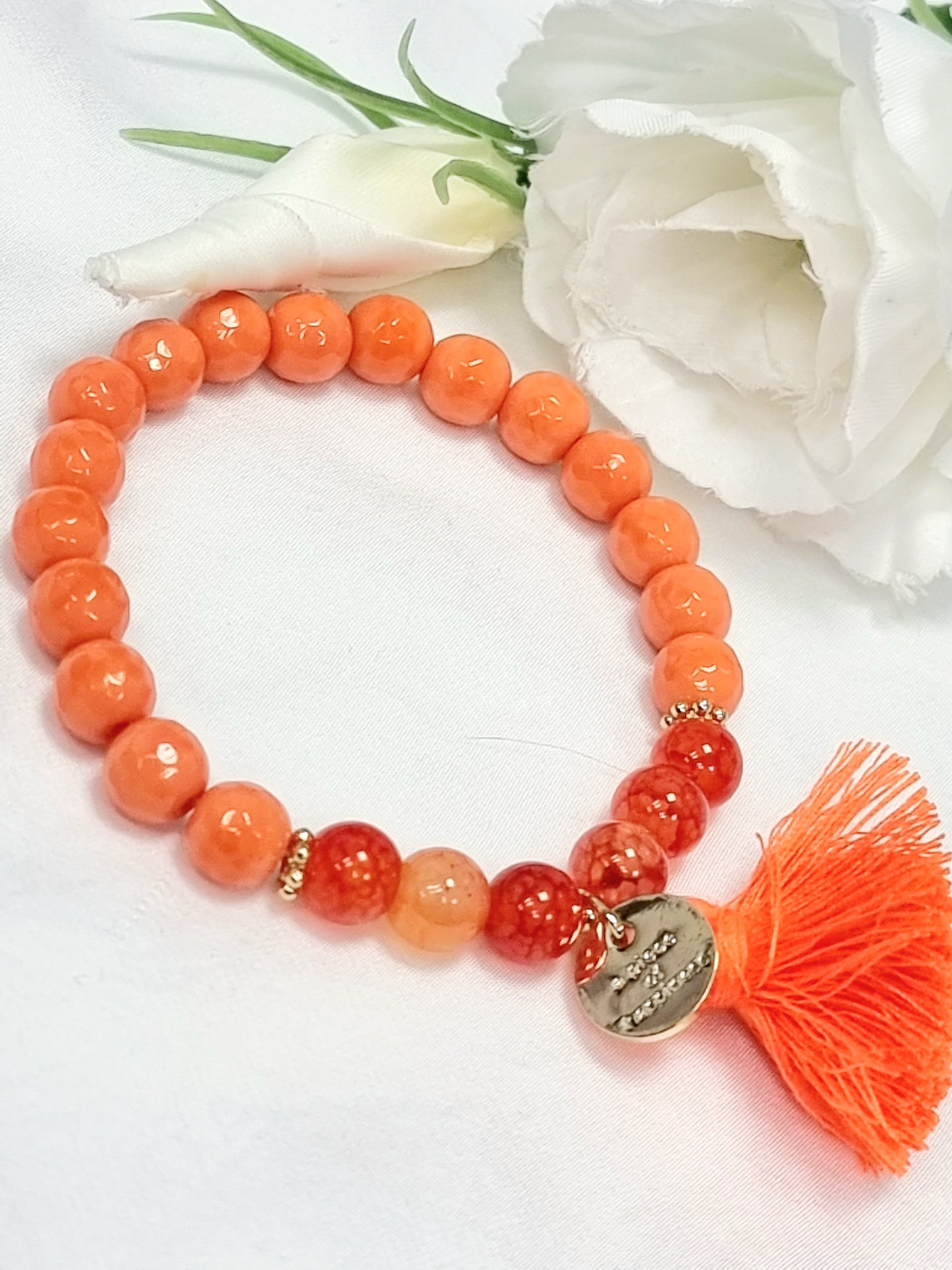 Armband Biba -Orange/Gold, Naturstein-, Glasperlen mit Goldanhänger und Quaste