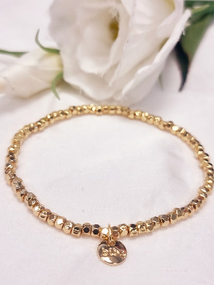 Armband Biba - Gold glänzend mit kleinen Würfelchen