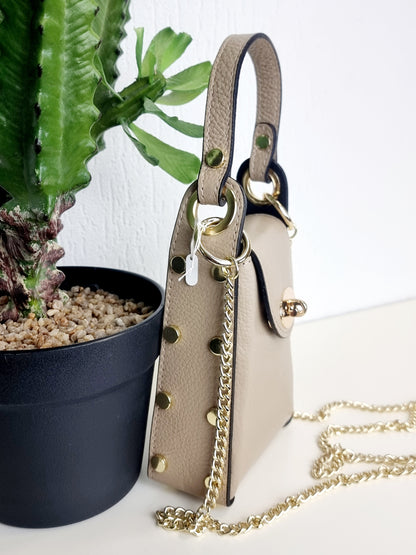 Mini-Handtasche aus echtem Leder Beige und Pink mit goldfarbenen Dreh-Verschluss und abnehmbarem Schulterriemen