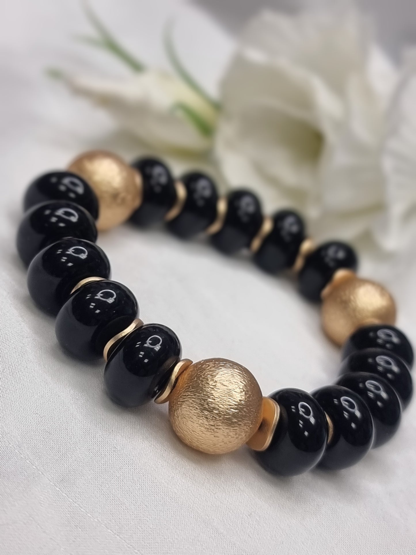 Armband Perlen schwarz mit goldenen Kugeln Modeschmuck von Biba