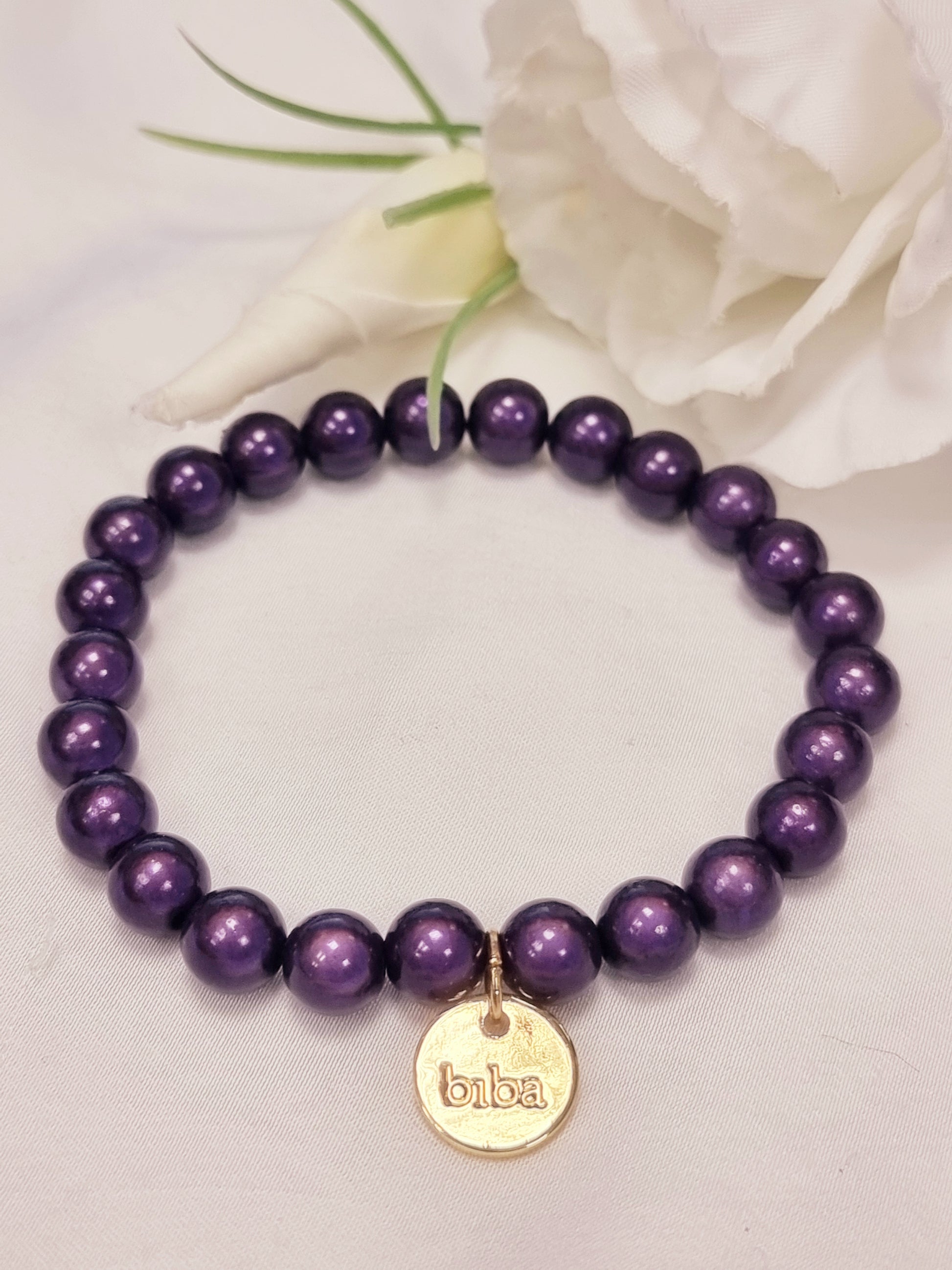 Armband Biba - fluoreszierende Perlen Lila 8 mm