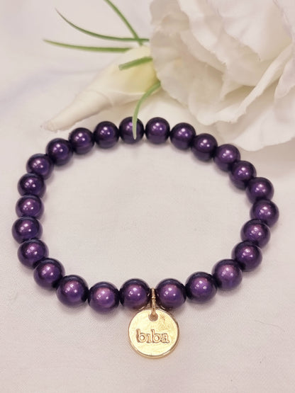 Armband Biba - fluoreszierende Perlen Lila 8 mm