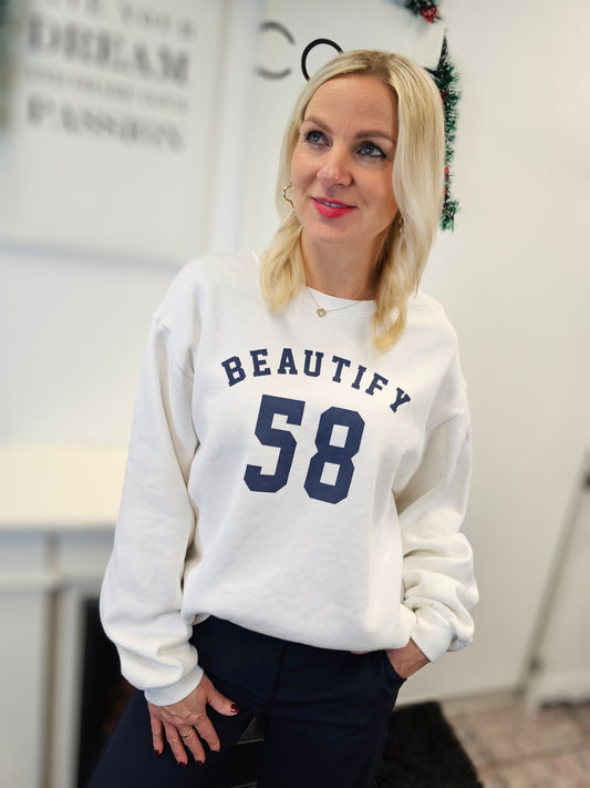 Sweater in Weiß-Blau mit Schriftzug Beautify